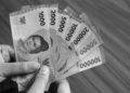 Terus Melemah, Rupiah Tembus Rp 15.709 Per Dolar AS.