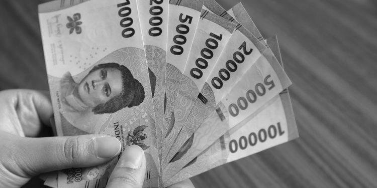 Terus Melemah, Rupiah Tembus Rp 15.709 Per Dolar AS.